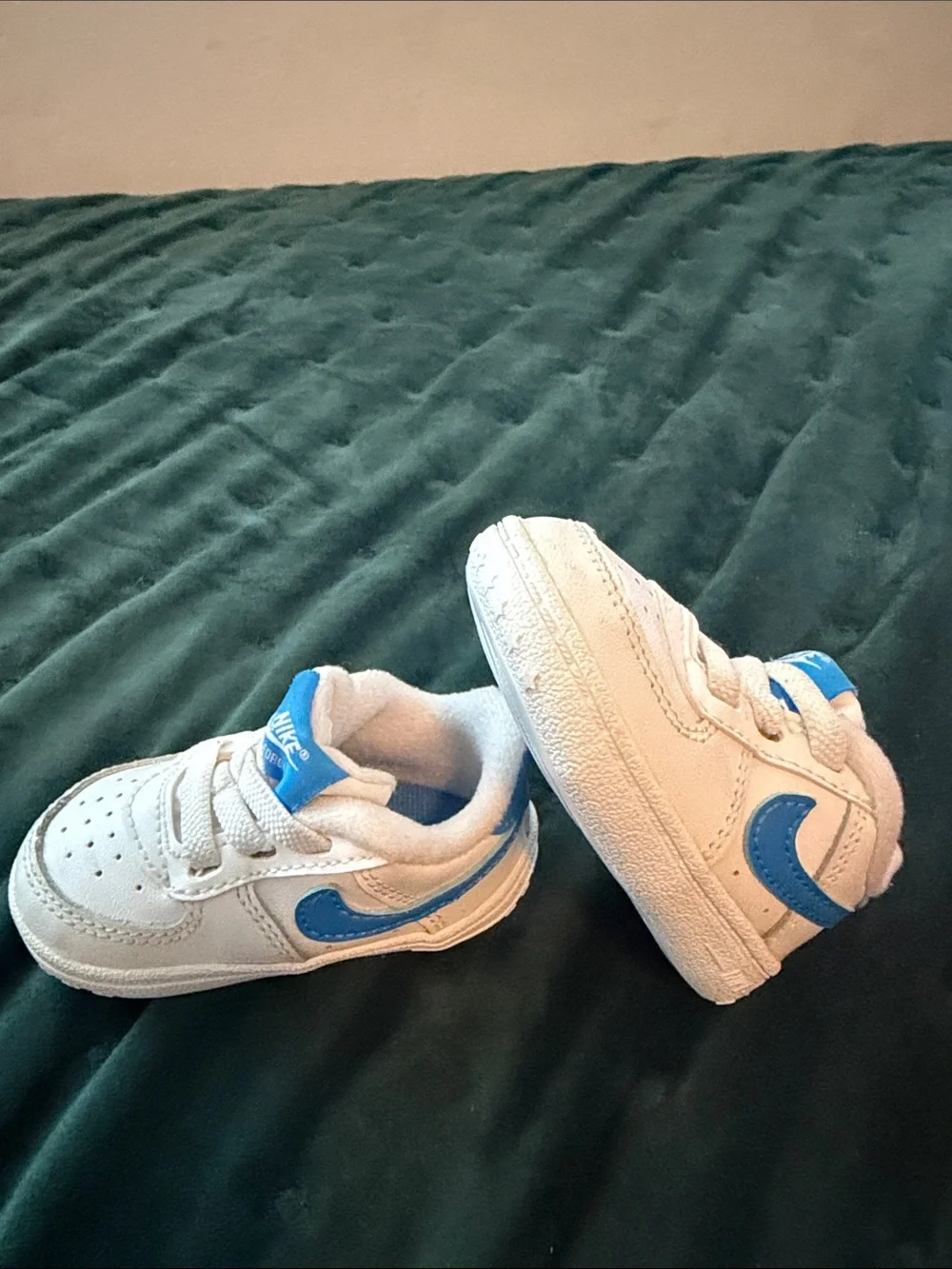 Nike Kids White Sneakers with Blue Logos